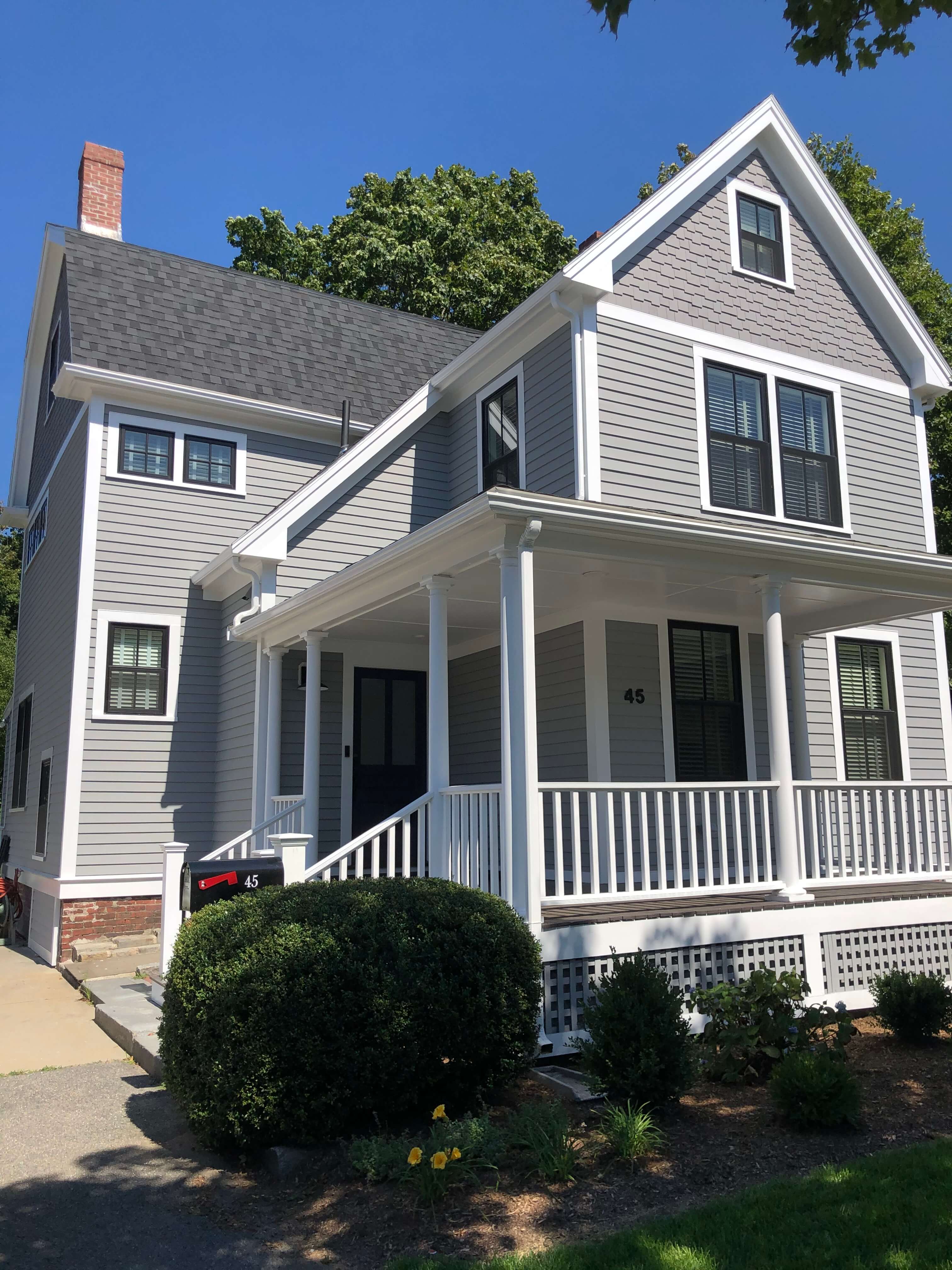 new gray siding on home