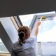 Woman Cleaning Skylight