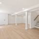 Minimalist,Empty,Room,With,Blond,Hardwood,Floors,For,Design,And